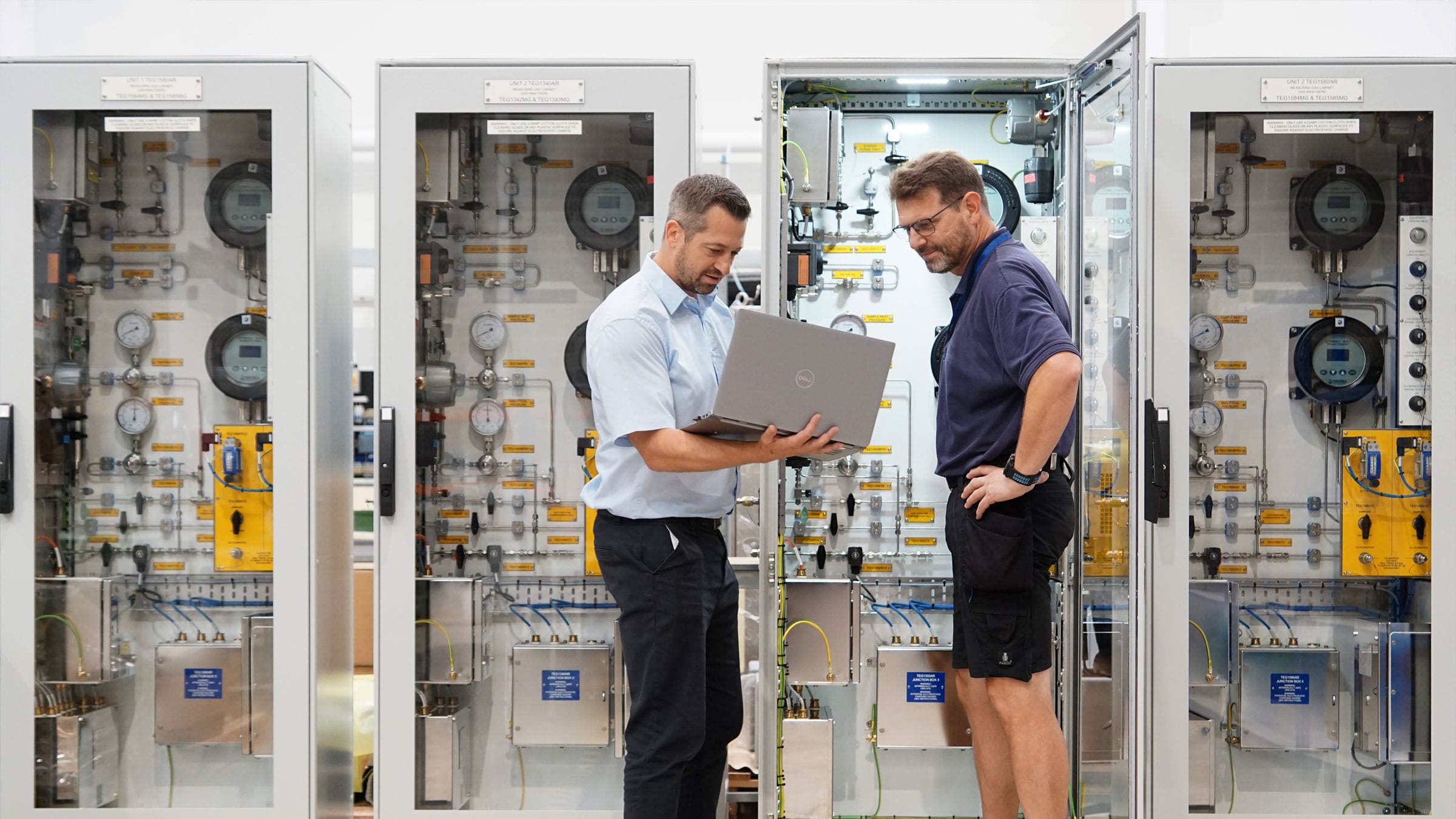 Looking over the laptop in front of panel system